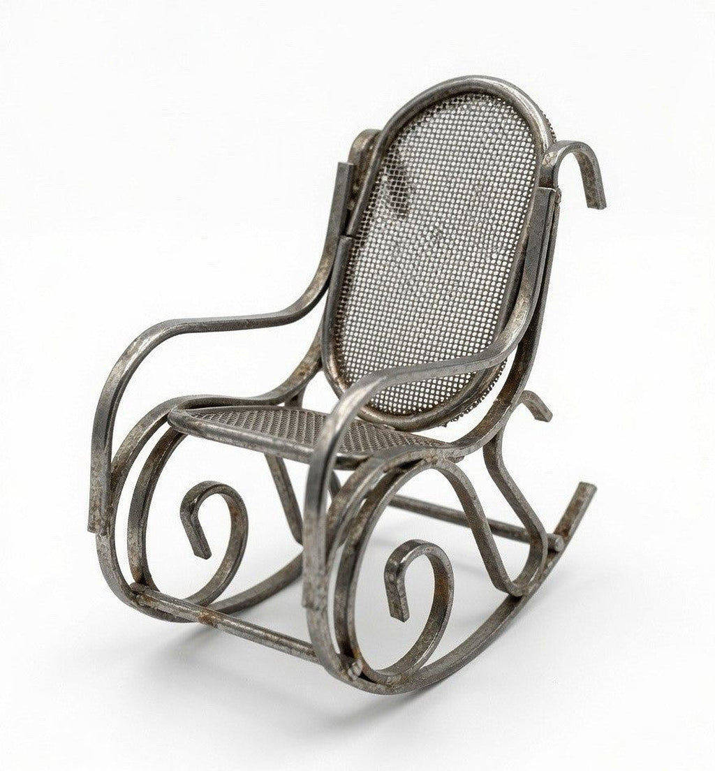 A metal rocking chair with a mesh backrest and curved armrests.